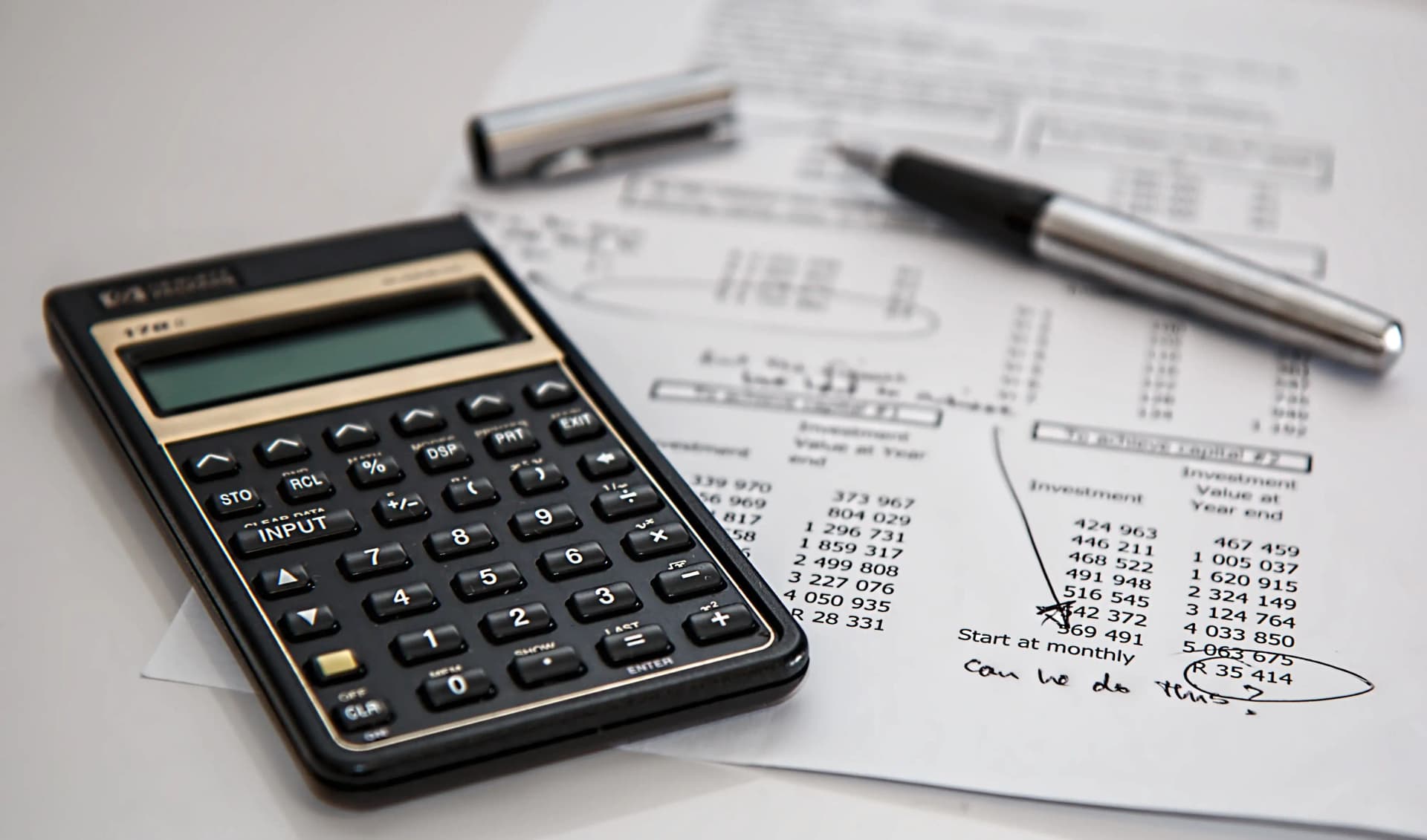 Calculator on top of a paper